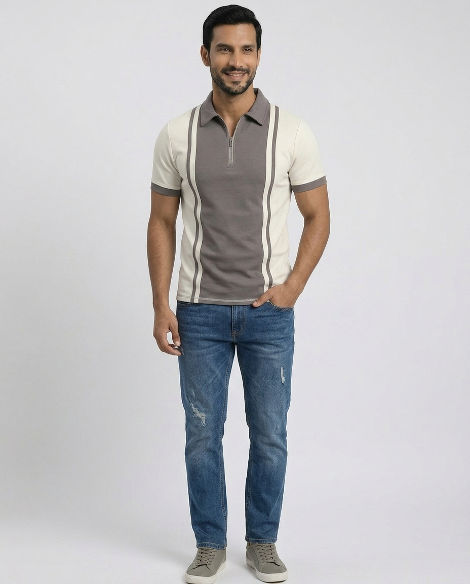 De contrast gebreide polo